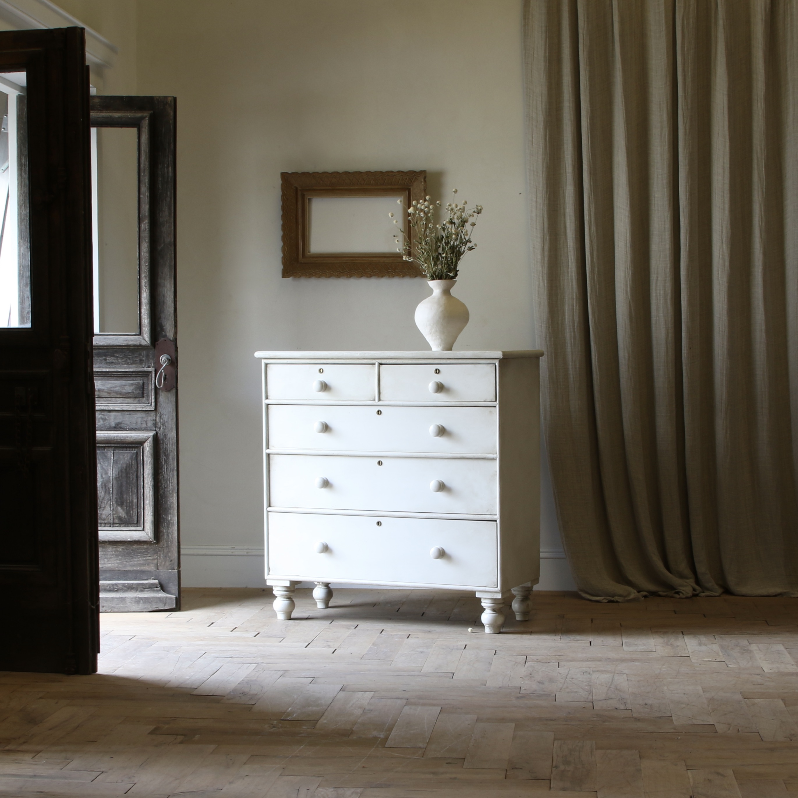 An English Painted Chest of Drawers